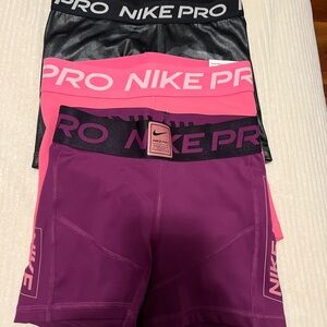 Nike Pro Shorts Trio in Black, Pink, and Purple
